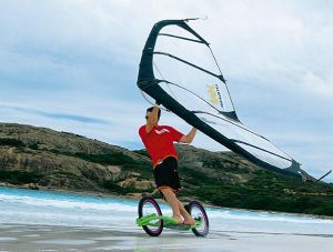 Kitewing on the beach with a Dirtsurfer